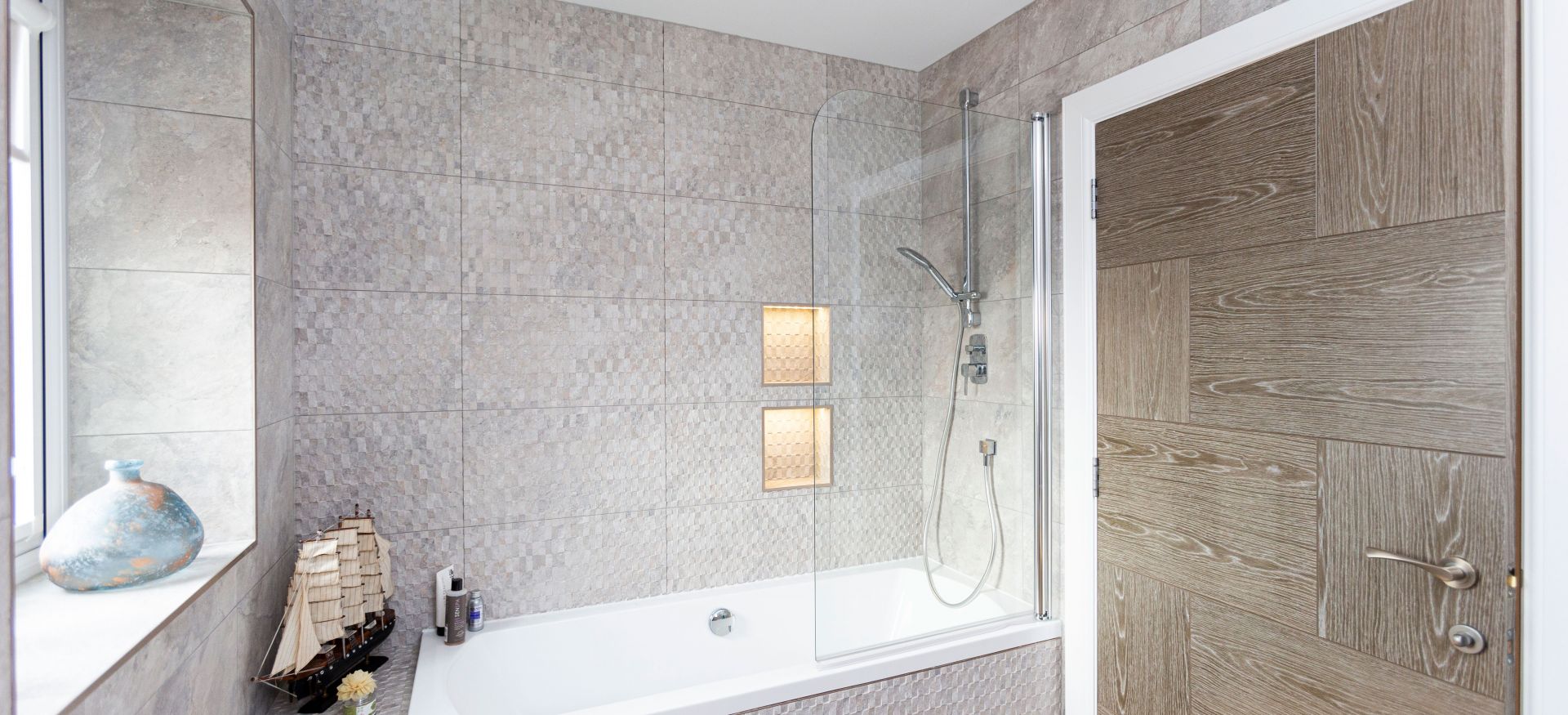 Some Spanish style with Porcelanosa concrete effect tiling. 